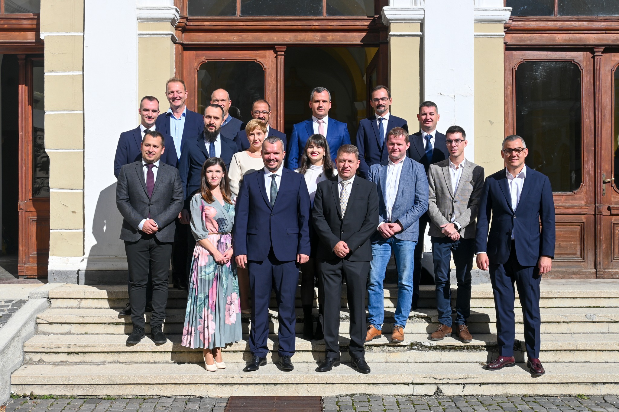 May be an image of 10 people and suit